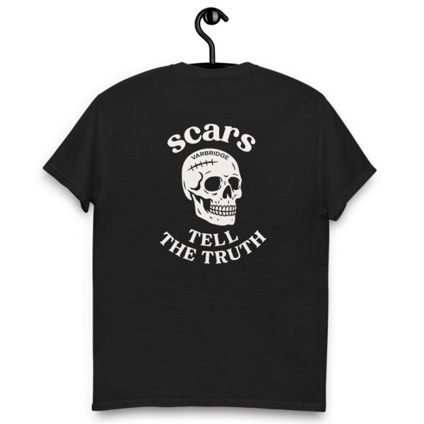 Black Varbridge t-shirt with a white skull illustration and the text “Scars Tell The Truth” arched above and below