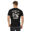 Man wearing black Varbridge t-shirt with “Made of More” kayaker and mountain graphic on back