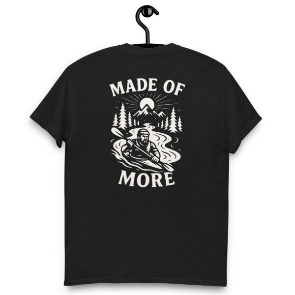 Black Varbridge t-shirt on hanger with “Made of More” adventure graphic featuring kayaker and mountain scene