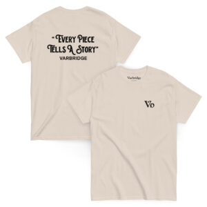 Flat lay of Varbridge t-shirt with “Every Piece Tells a Story” back print and Vb front logo